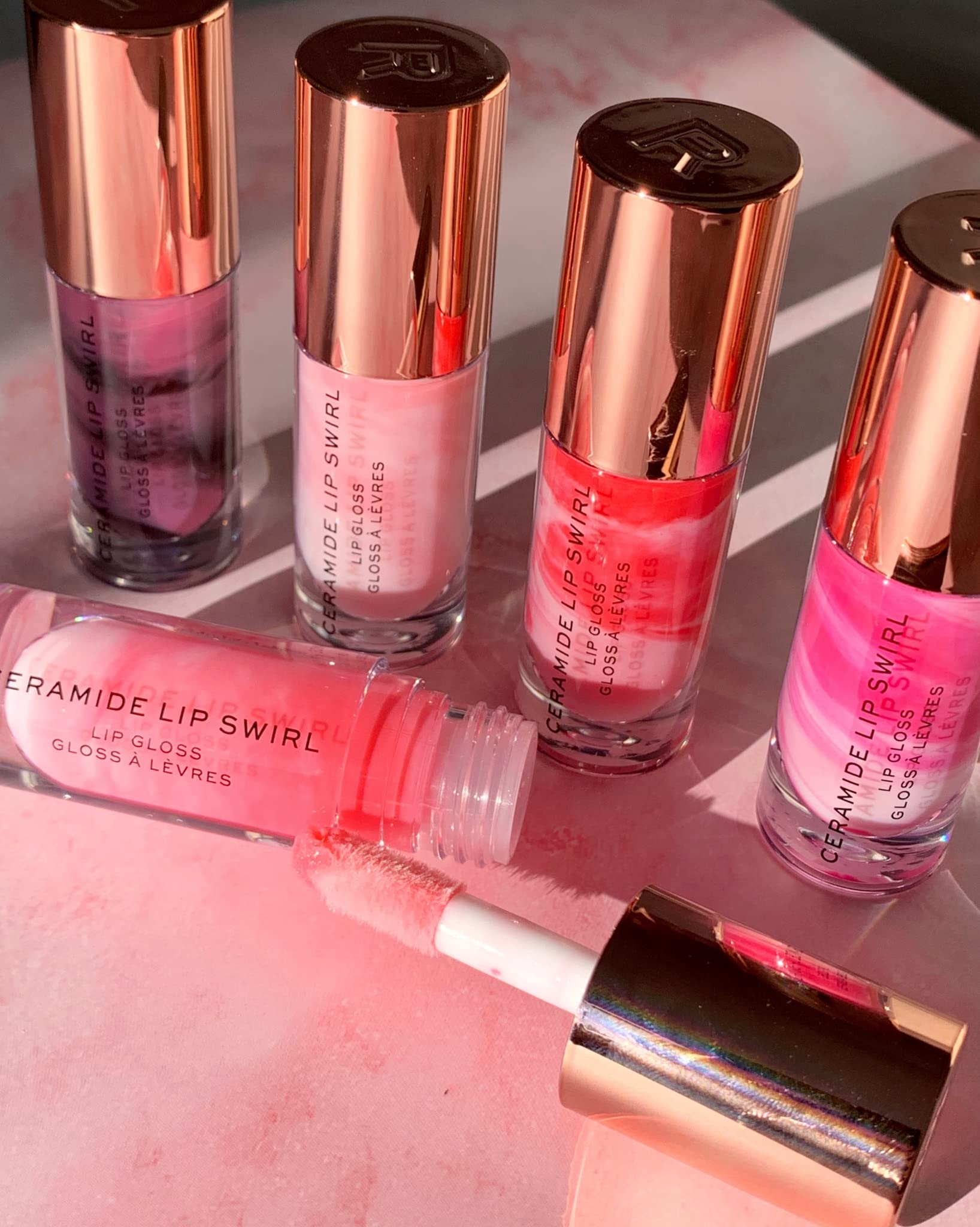 Revolution Swirl Ceramide Lip Gloss Berry Pink