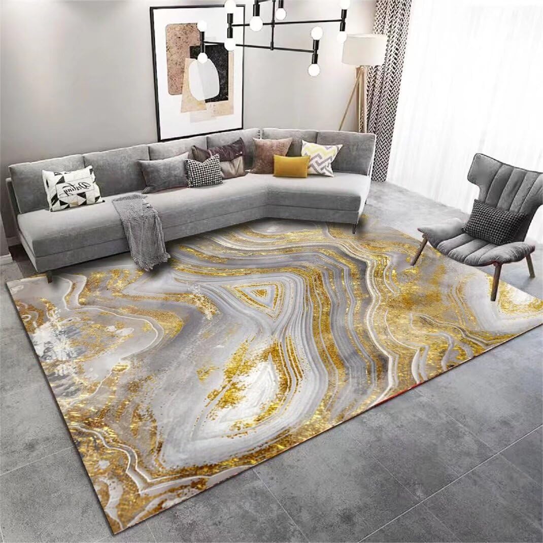 Tapis grande taille salon aux poils courts et finitions or au design floral abstrait haut de gamme
