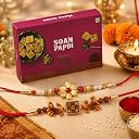 CraftVatika Rakhi Gift Hamper for Brother with Soan Papdi, Rakhi Gift Combo Set, Rakhis for Rakshabandhan, Peacock Om Rakhis Set of 2 for Brother Boy Bhaiya Man Bhai, Raakhee with Sweets Card & Tilak gallery image