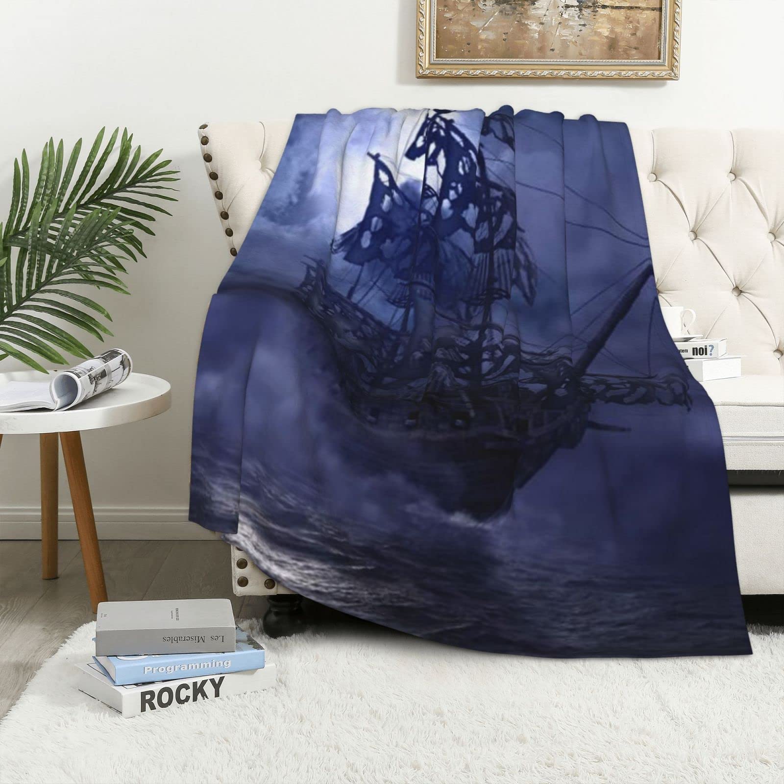 Couverture flanelle pirate pour une soirée cinéma cocooning sur le canapé du salon