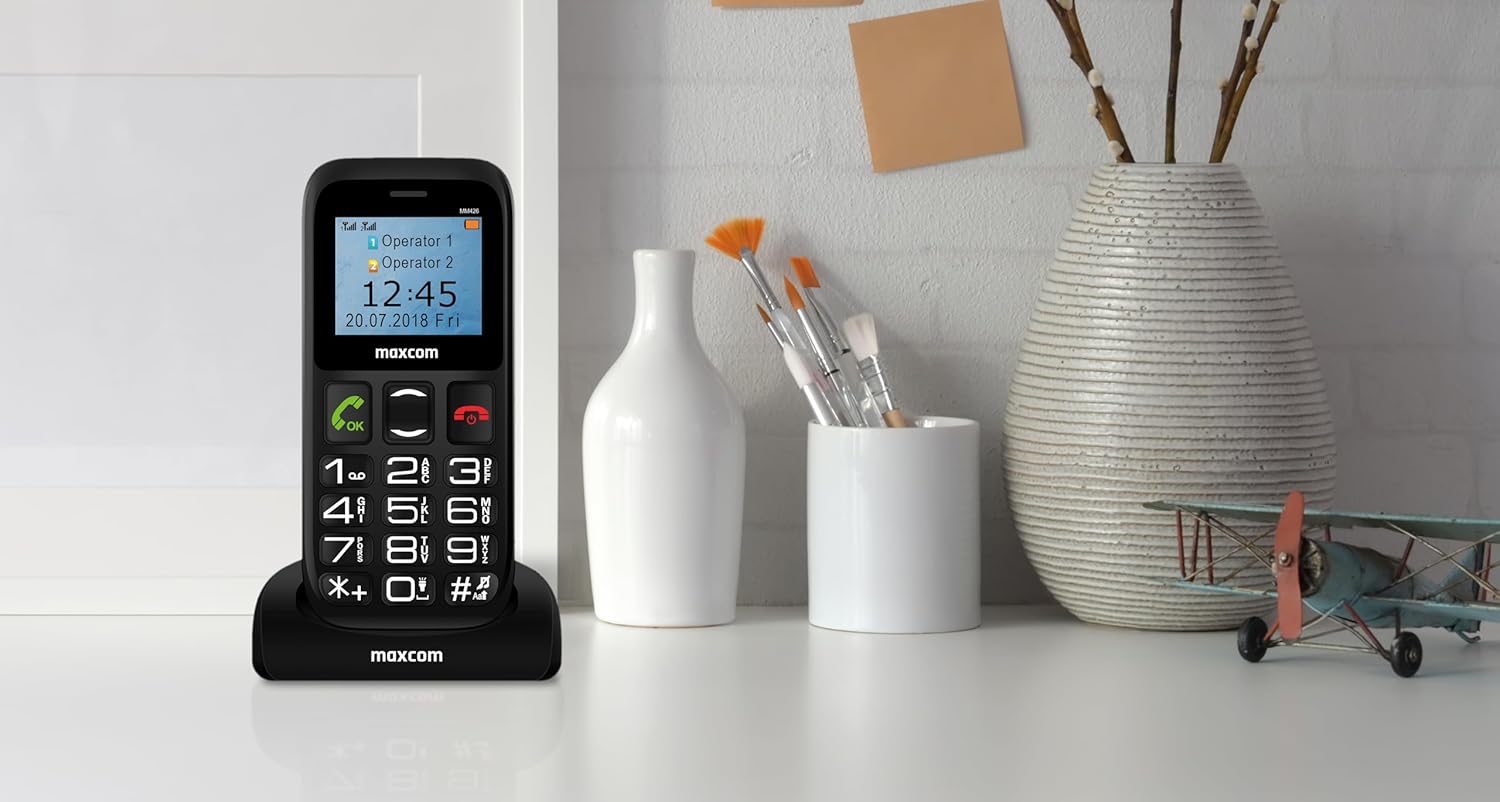 Maxcom MM426 Mobile Phone in charging cradle