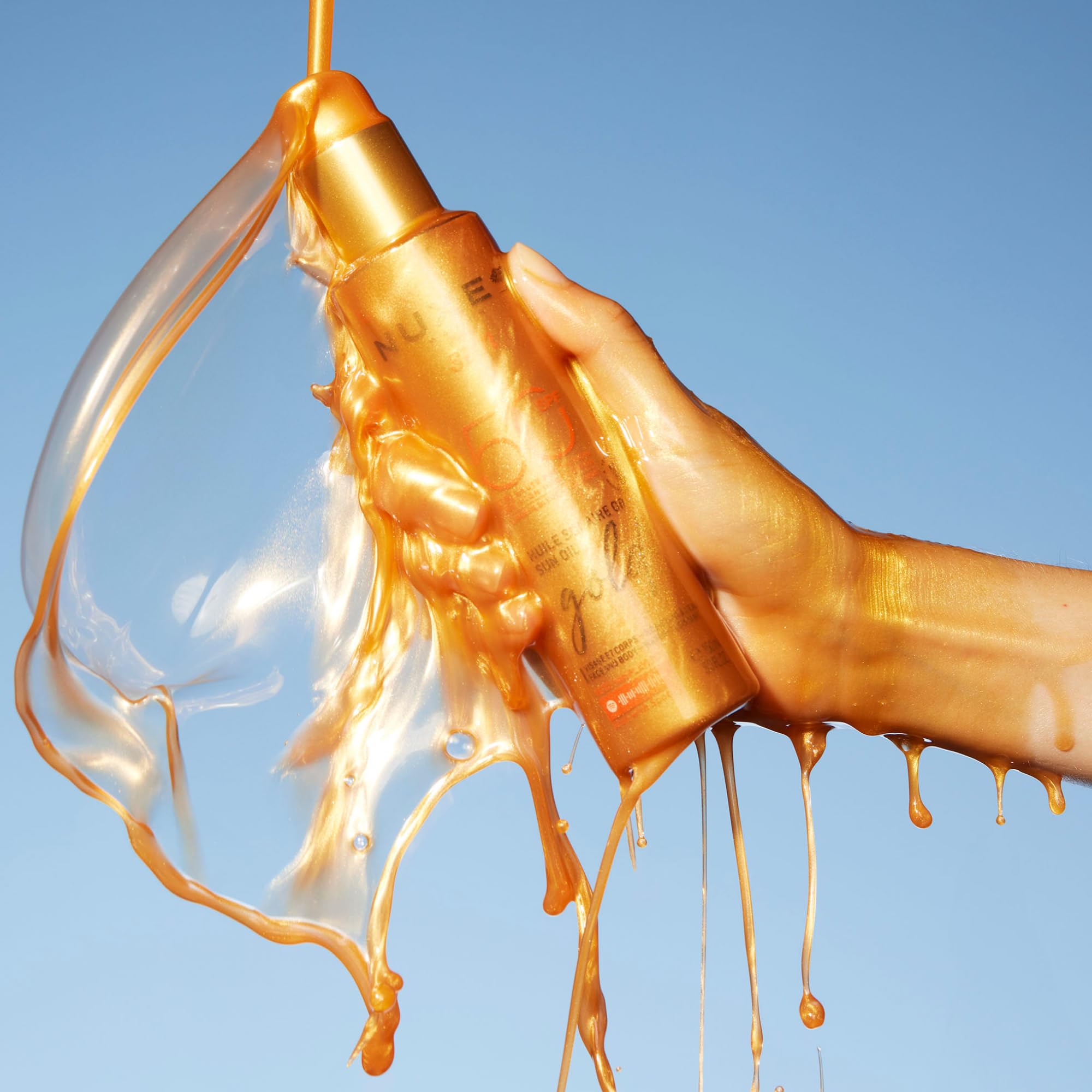 Nuxe Sun Gold Olio Abbronzante SPF50 150 ml, Olio Solare Protettivo, Protegge Viso e Corpo da UVA/UVB e Luce Blu, Previene Macchie Scure e Segni dell'Invecchiamento, Formula Resistente all'Acqua