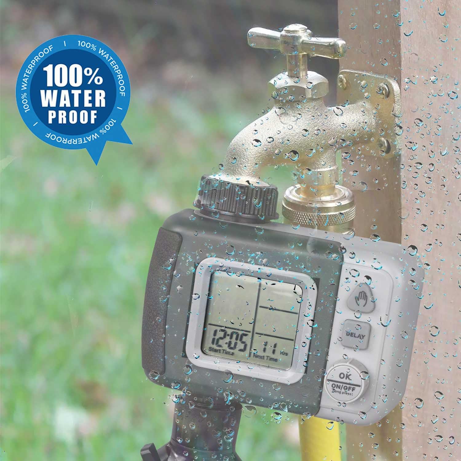 Water timer being sprayed with water, demonstrating waterproof feature