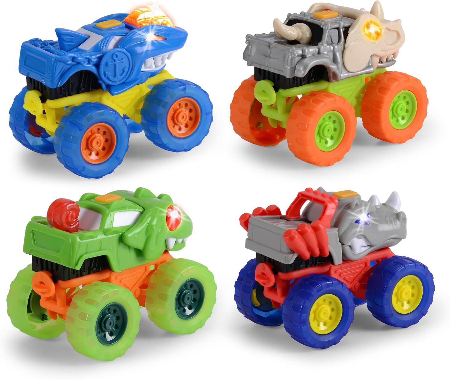 Four different Dickie Toys Monster Squad cars: a blue shark-themed car, a grey dinosaur-themed car, a green dinosaur-themed car, and a red rhino-themed car.