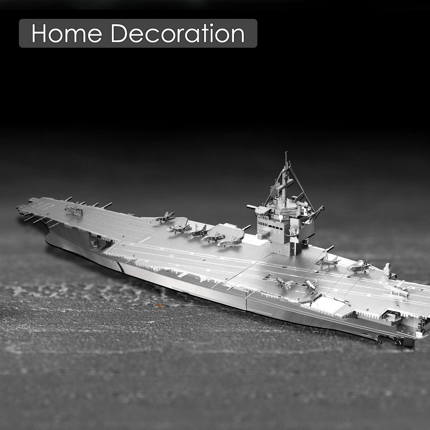 The assembled Piececool USS Enterprise CVN-65 model displayed on a dark surface, suitable for home decoration.