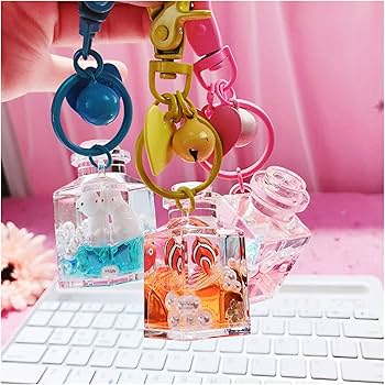 Amazon.co.jp: キーチェーンの創造カクレクマノミ動物の世界の水流砂