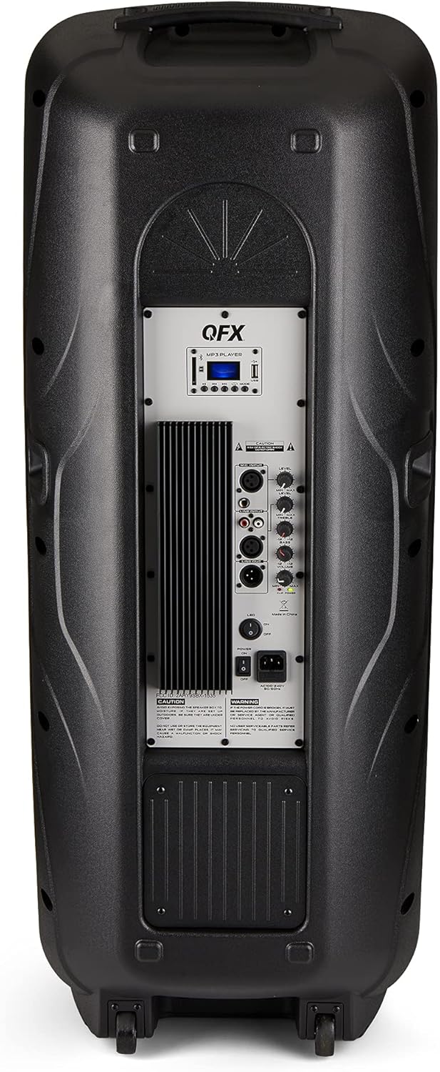 Rear panel of the QFX E-B3 speaker showing various input ports, control knobs, and the power switch.