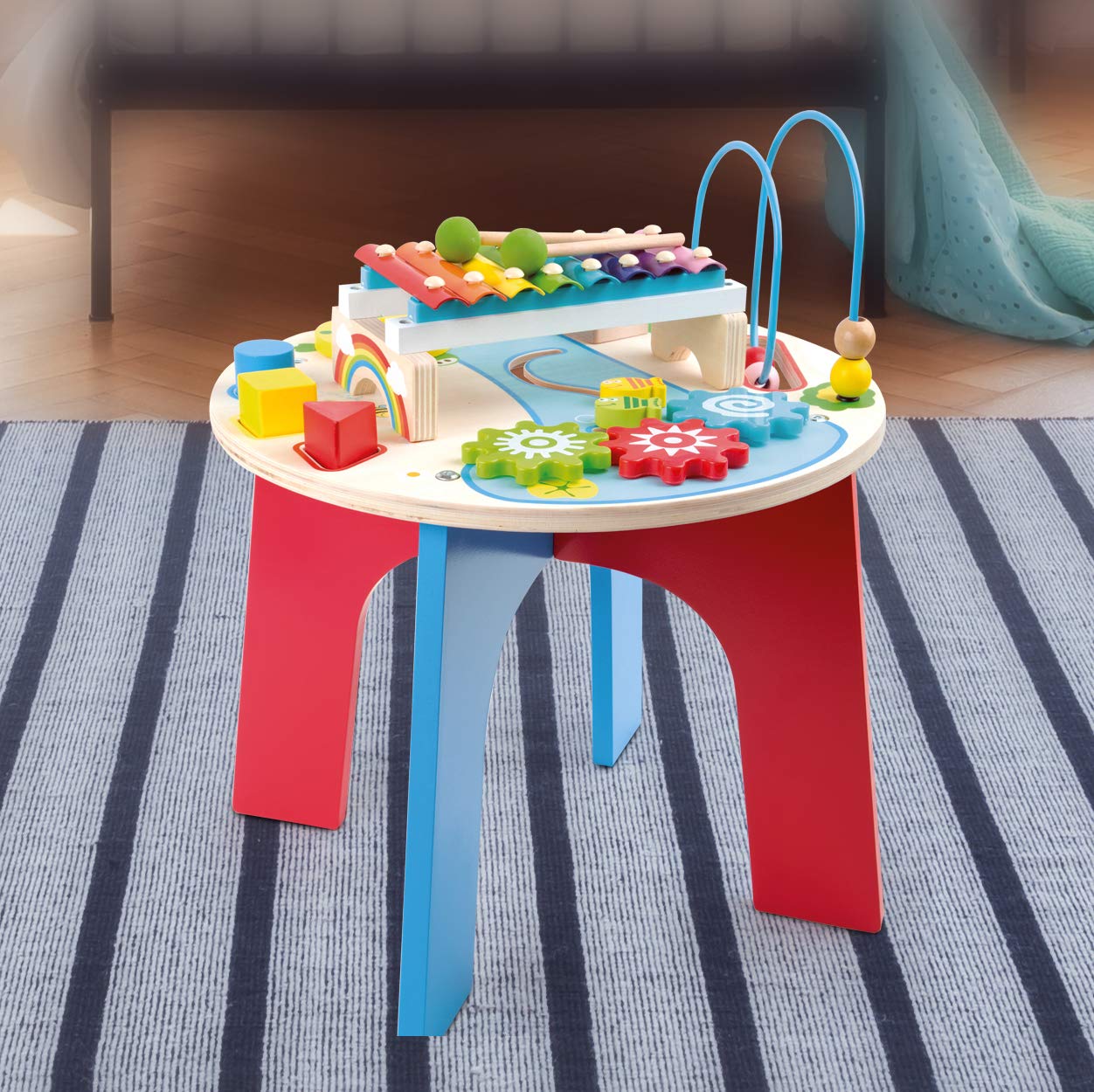 10321 Tavolo musicale e motorio "2 in 1" small foot in legno, con anello motore, gioco con formine, xilofono, a partire da 1,5 anni