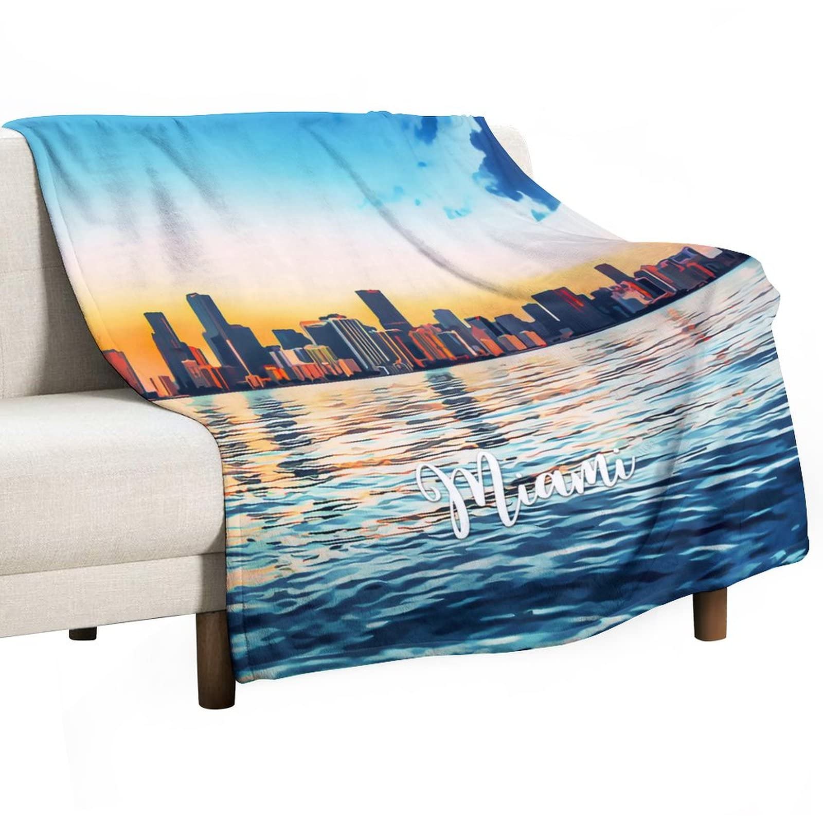 Couverture douce Miami anti-frissons 130 x 150 cm pour réchauffer vos soirées froides sur le canapé