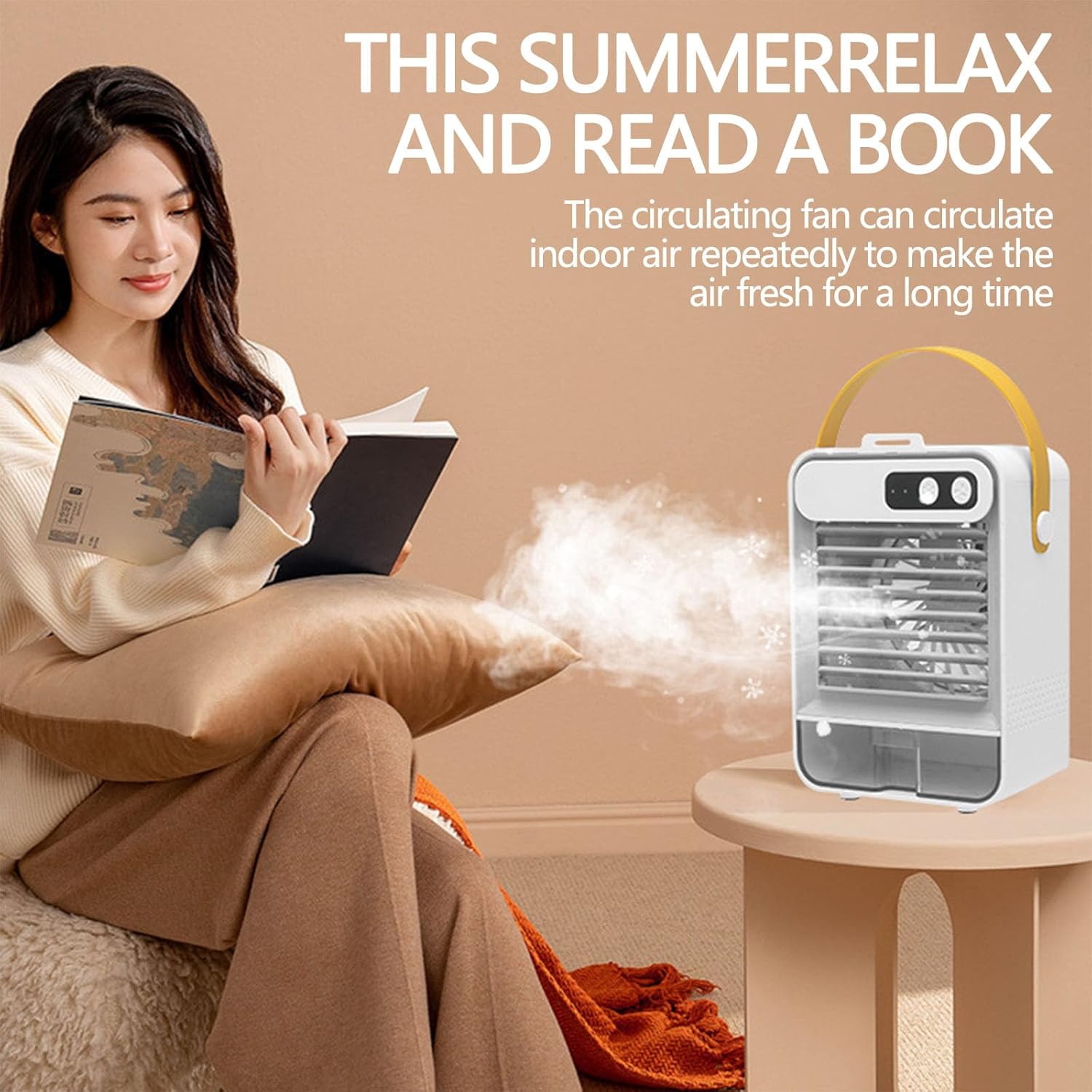 Woman relaxing on a couch reading a book with the portable air conditioner on a side table.