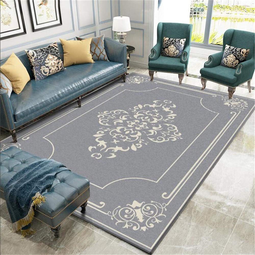 Tapis de salon gris clair résistant pour protéger le sol des chaises à roulettes