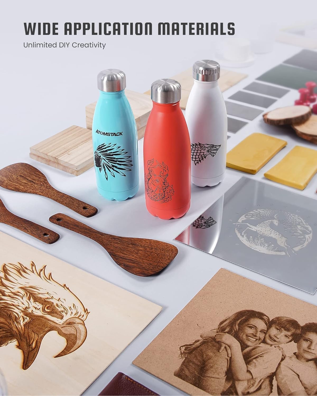 Various items showcasing the wide application materials for the ATOMSTACK A5 Pro, including engraved metal water bottles, wooden spoons, and acrylic sheets.