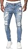 Jeans entallados azules de hombre con rotos y rayas laterales 1