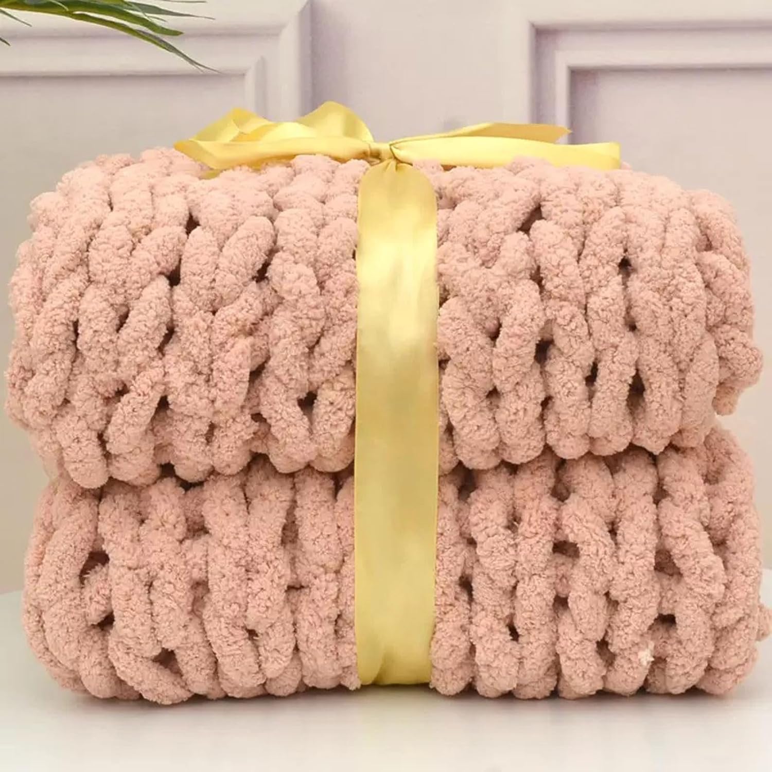 Couverture en tricot épais pour vos soirées cocooning au salon