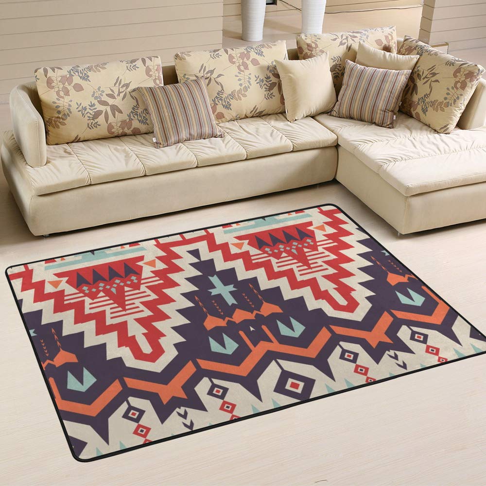 Tapis ethnique géométrique Ruchen grand format tissage premium