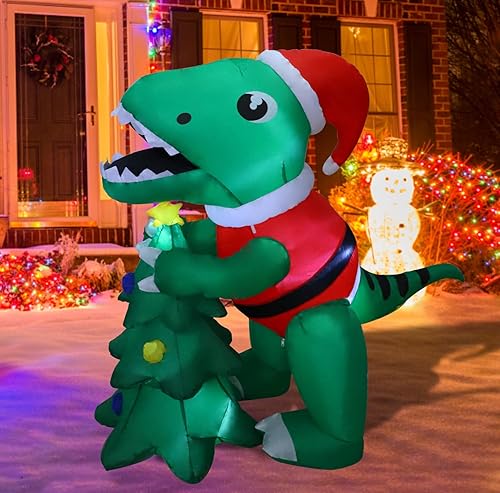 Miniatura 6 de MorTime Dinosaurio inflable de Navidad de 5 pies con caja de regalo, accesorio inflable para patio, dinosaurio verde animado iluminado con sombrero