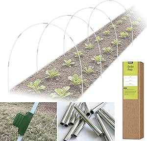RIFNY white garden hoop kit with fiberglass rods, connectors, clips, and a low tunnel over young plants