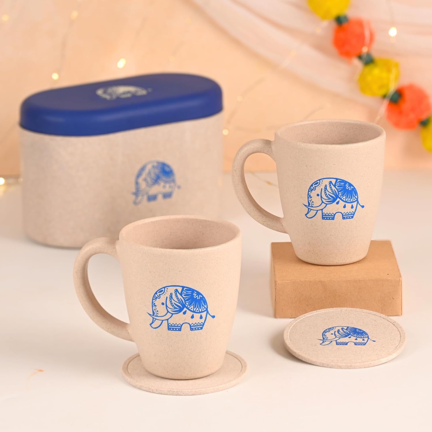 Eha Earth-Friendly Wedding Gifts for Couple | Gifts Made with Rice Husk Biocomposite | Elephant Printed Mug and Coasters Set of 2, Fairy Lights, Keychain, Loopac Box | 300 ml | Sand Castle Eha Earth-Friendly Wedding Gifts for Couple | Gifts Made with Rice Husk Biocomposite | Elephant Printed Mug and Coasters Set of 2, Fairy Lights, Keychain, Loopac Box | 300 ml | Sand Castle