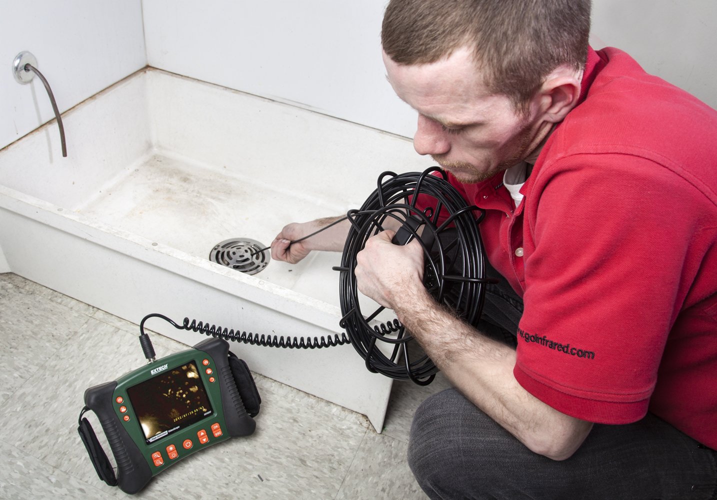 Close-up of an Extech HDV600 camera probe tip with illuminated LEDs.