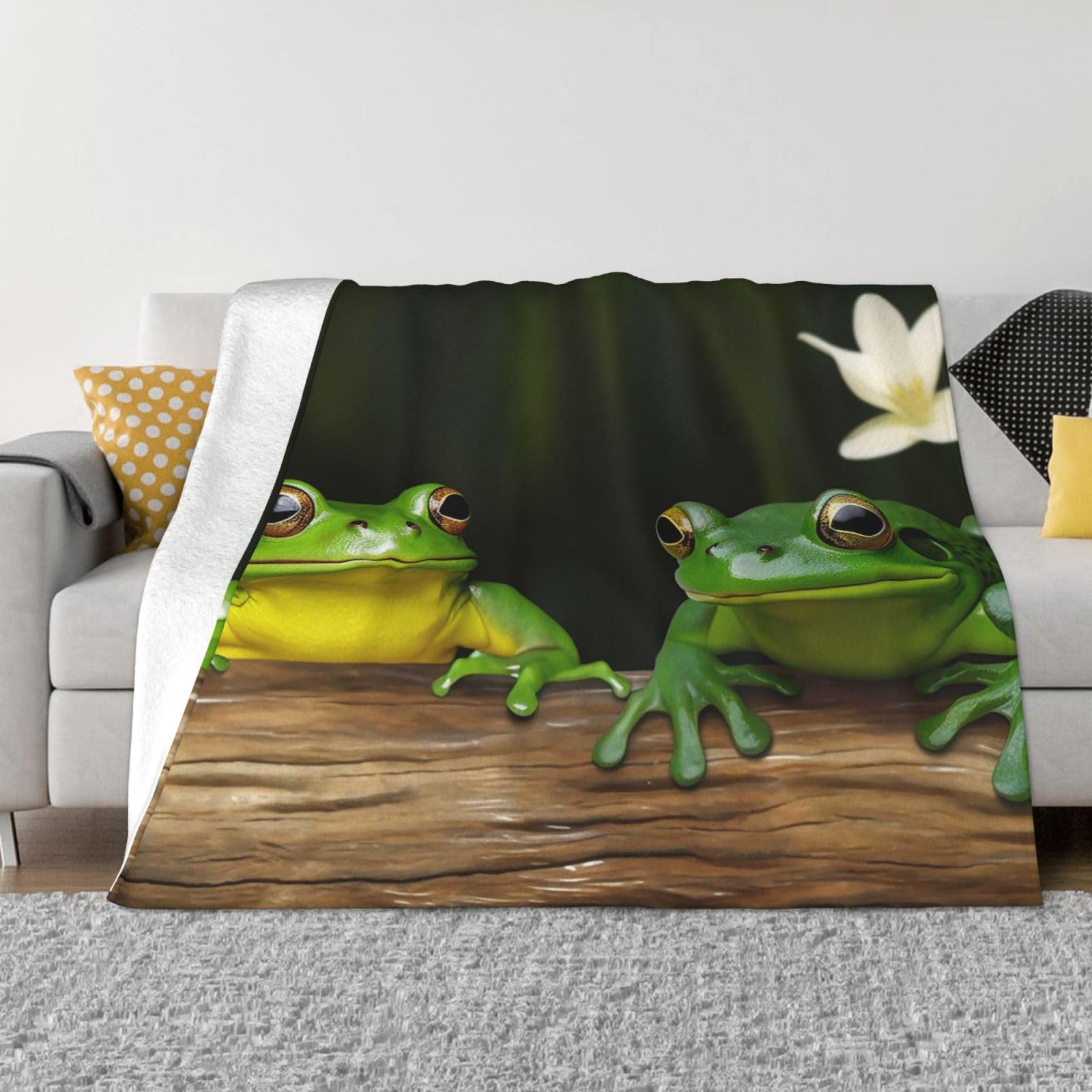 Couverture polaire grenouilles vertes pour envelopper de douceur la chambre des enfants