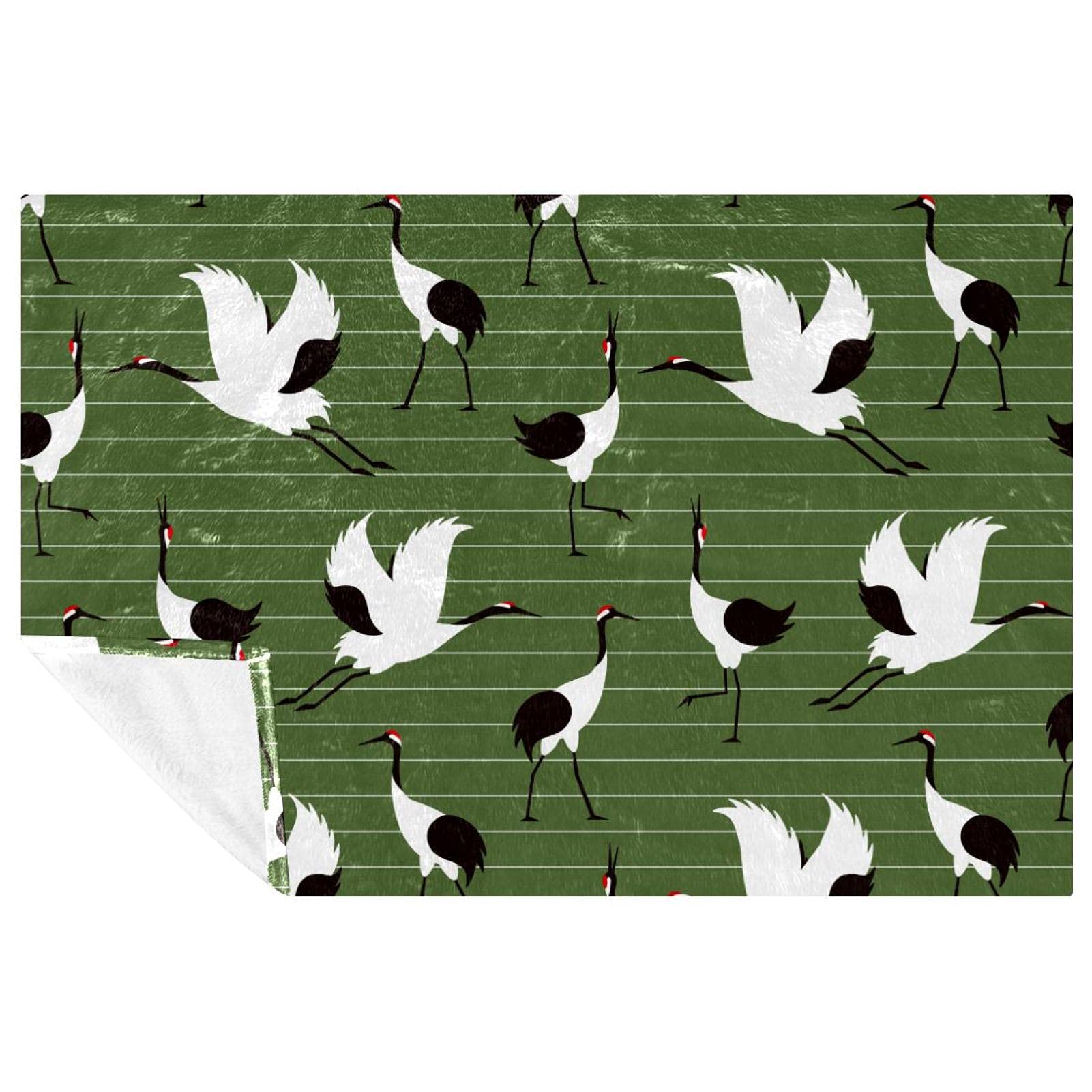 Couverture douce grues japonaises un cocon de bien-être pour la maison