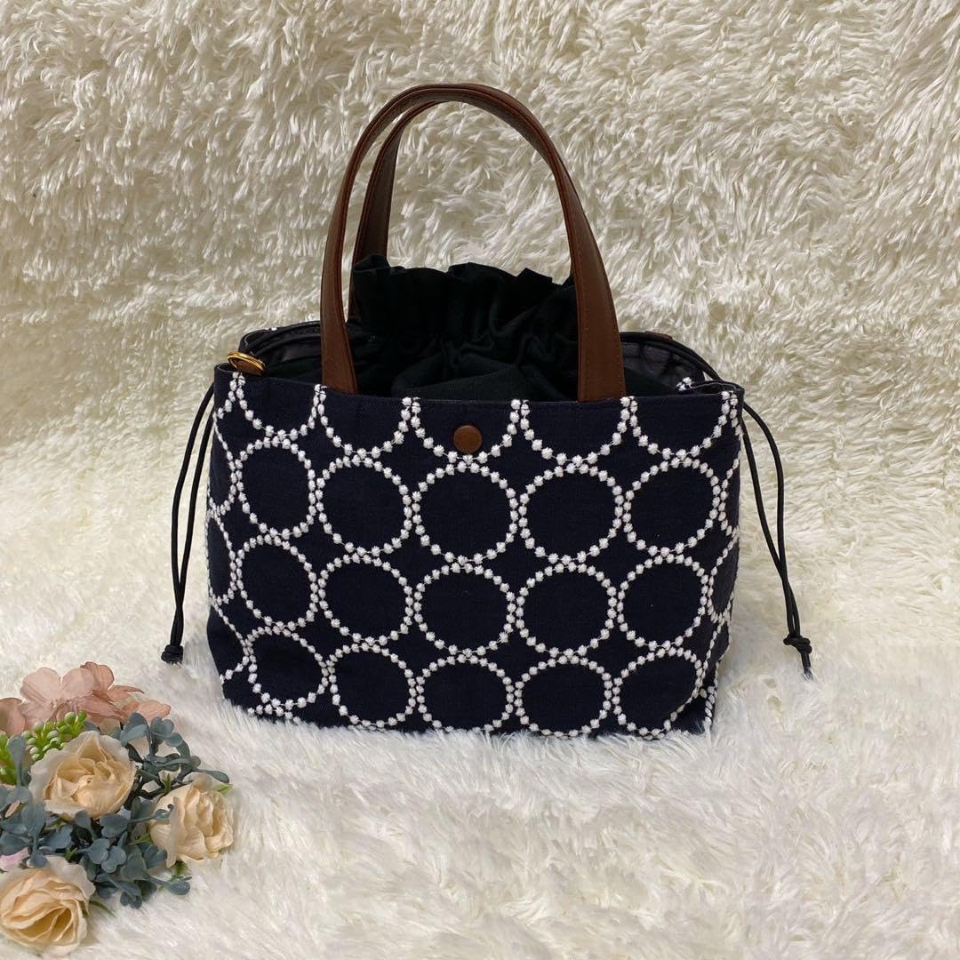 1570】あおりポケットの巾着バッグ＊ミナペルホネン mina perhonen