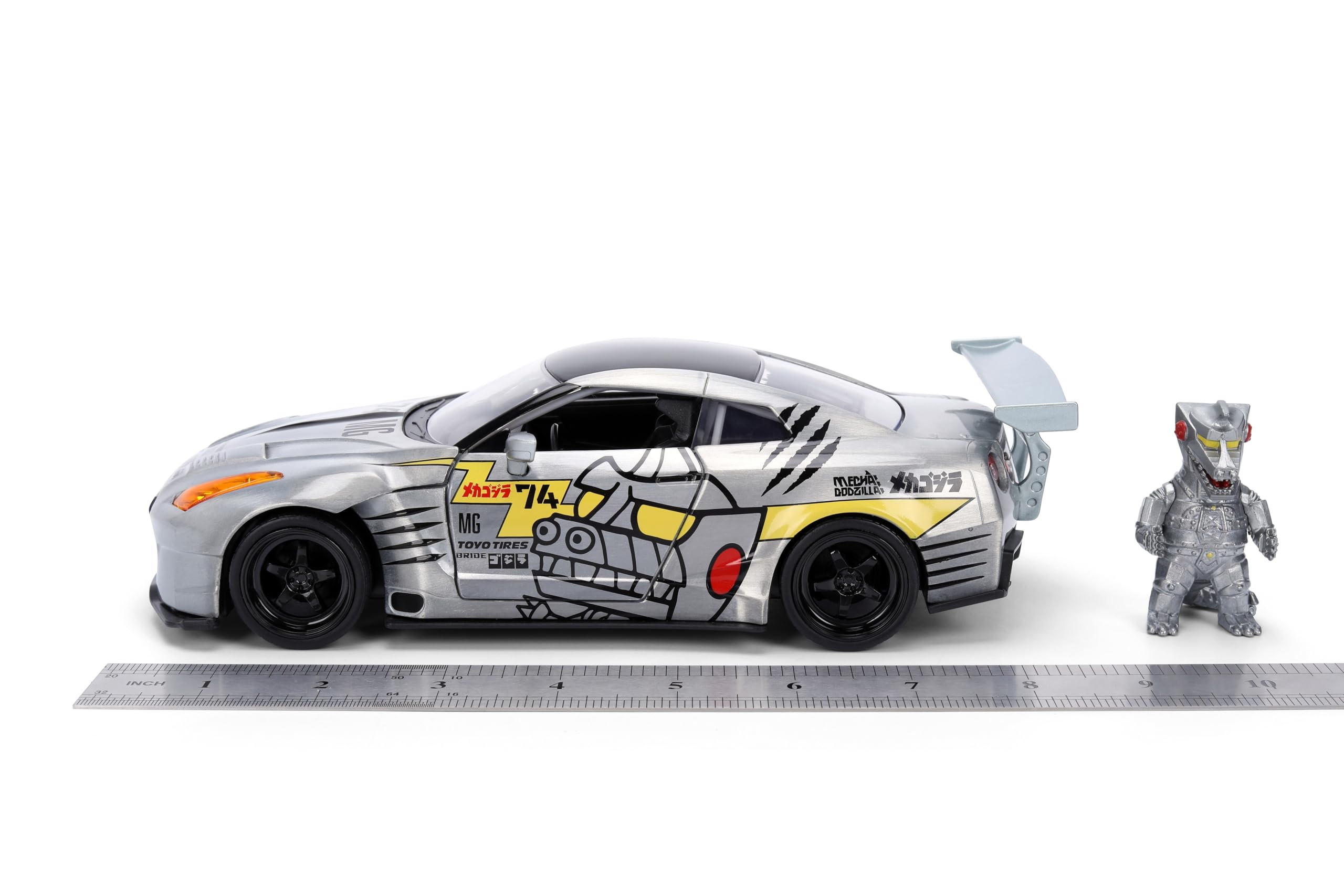 Jada Mechagodzilla z 2009 Nissan GT-R R35 Ben Sopra - 1:24 Anime Hollywood Rides - odlewane samochody i figurki - otwierane drzwi, kaptur i bagażnik - kolekcja - wiek 8+ - wielokolorowy