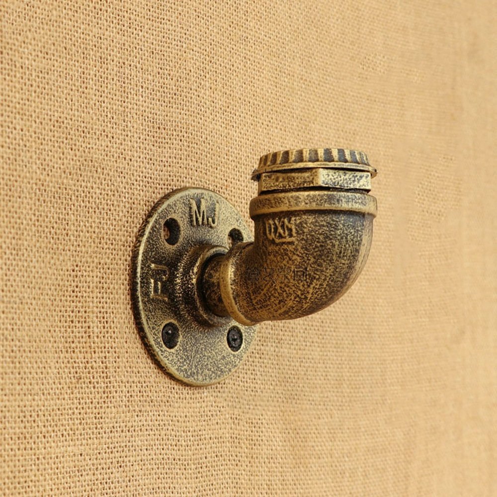 Lámparas de pared creativas tipo tubería de agua para transformar pasillos oscuros en zonas de diseño