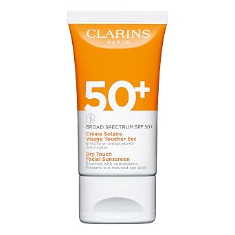 Clarins Dry Touch Face Sunscreen | Broad Spectrum SPF 50+ | UVA/UVB Protection | خفيف الوزن ولا أبيض مصبوب | غني بمضادات الأكسدة | جميع أنواع البشرة، بما في ذلك البشرة الحساسة | 1.7 أوقية