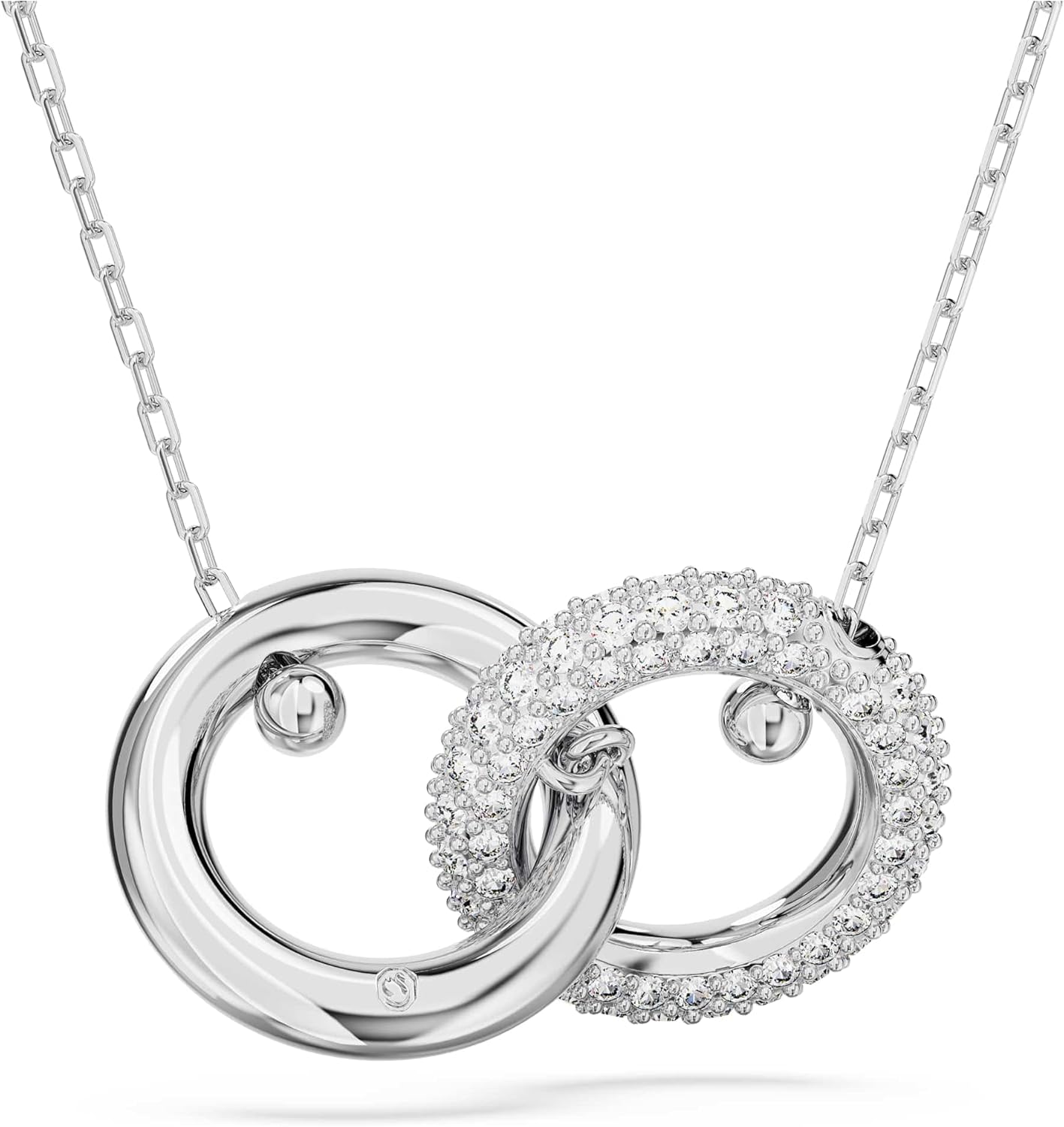 Swarovski Dextera Pendant Necklace, White Pavé Crystals Interlocked with a Gold-Tone Plated Ring on a Gold-Tone Plated Chain, from the Dextera Collection