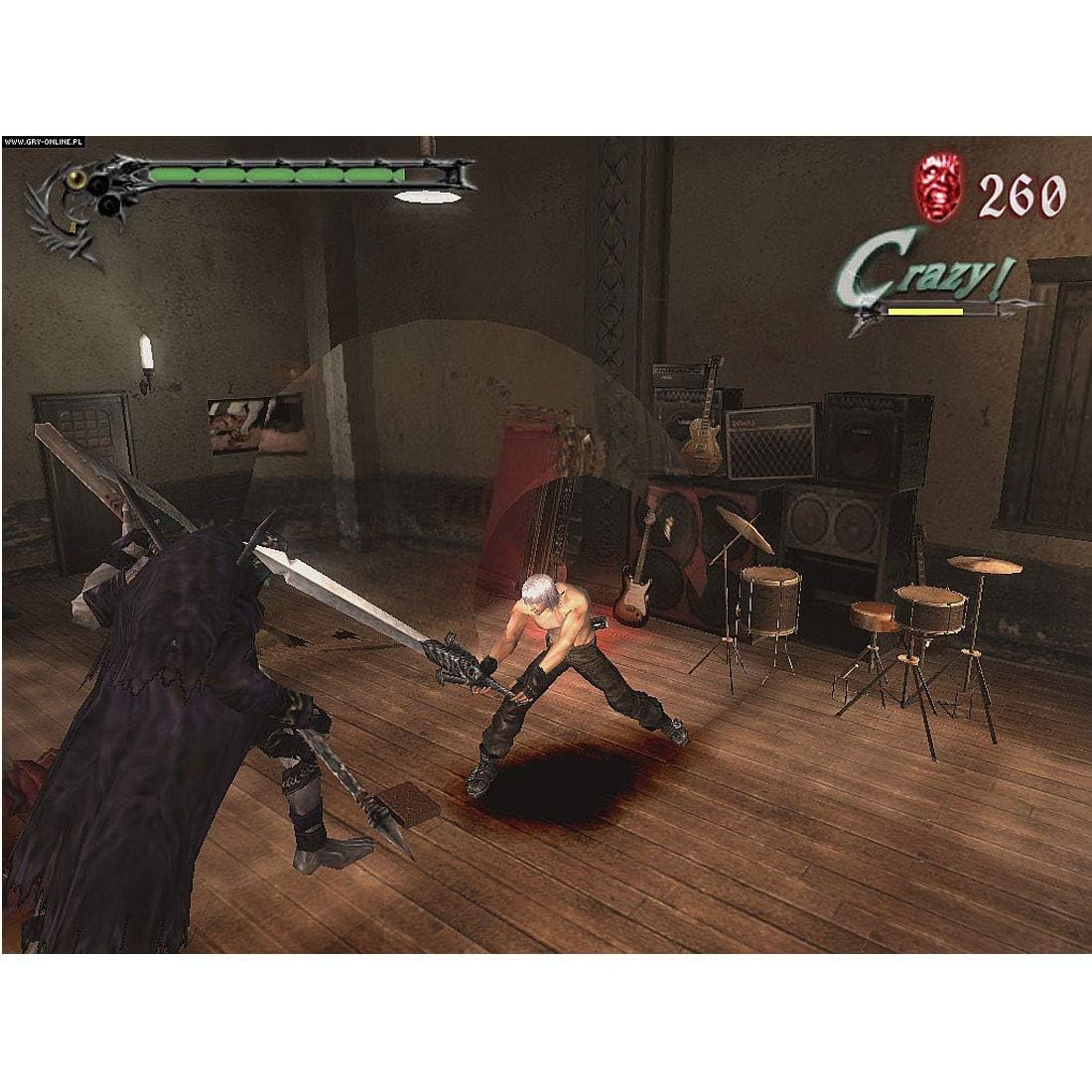 In-game screenshot of Dante fighting a demon with a large sword