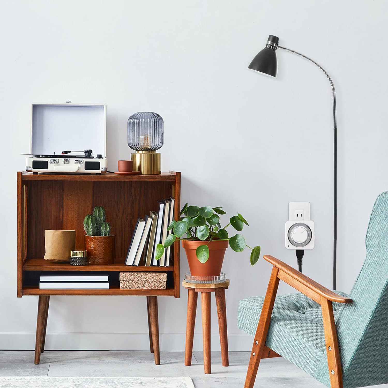 BN-LINK timer plugged into a wall outlet in a living room setting