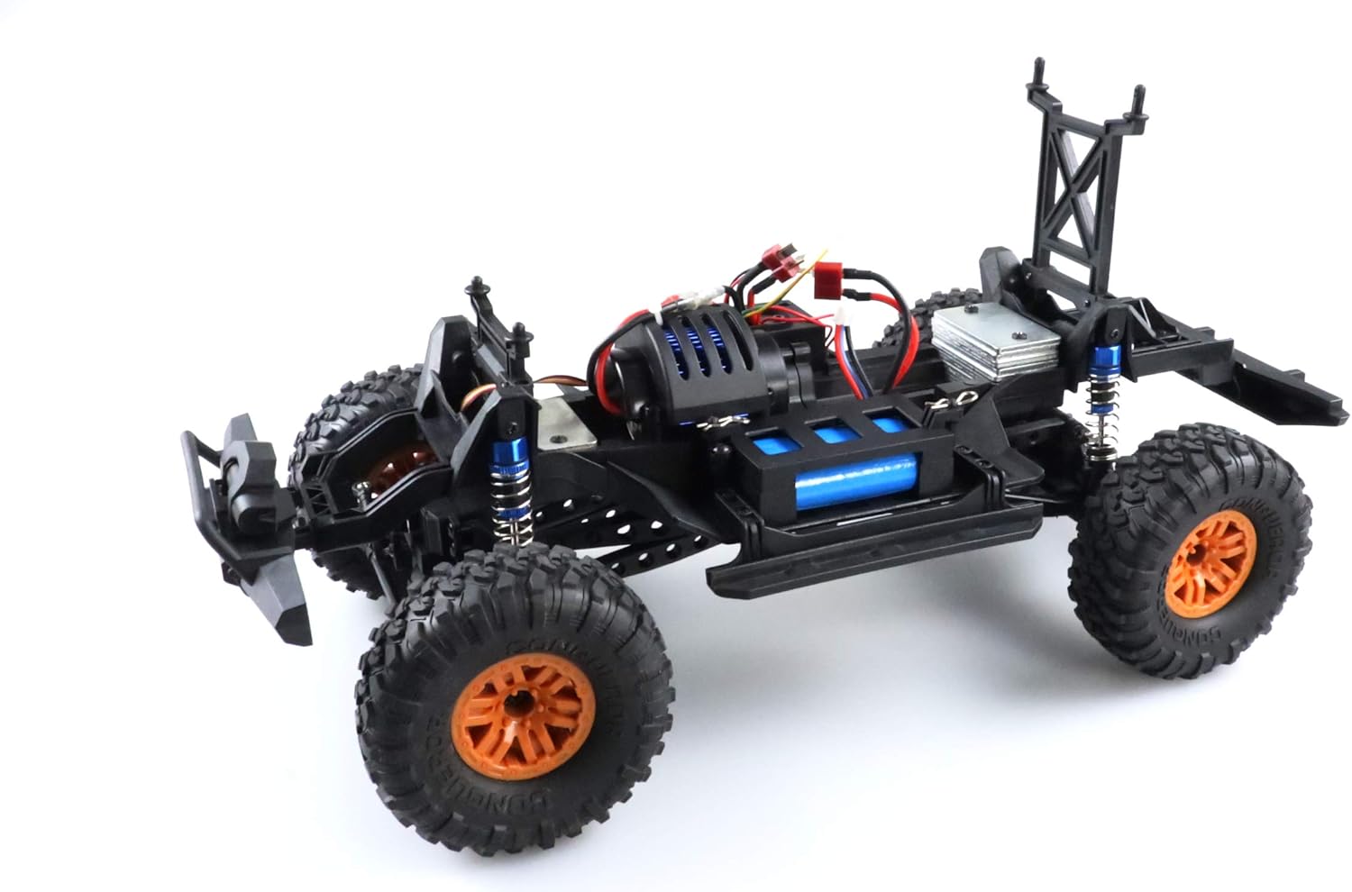 അടിവശം view of the Amewi Climbing Beast chassis, showing suspension and drivetrain components.