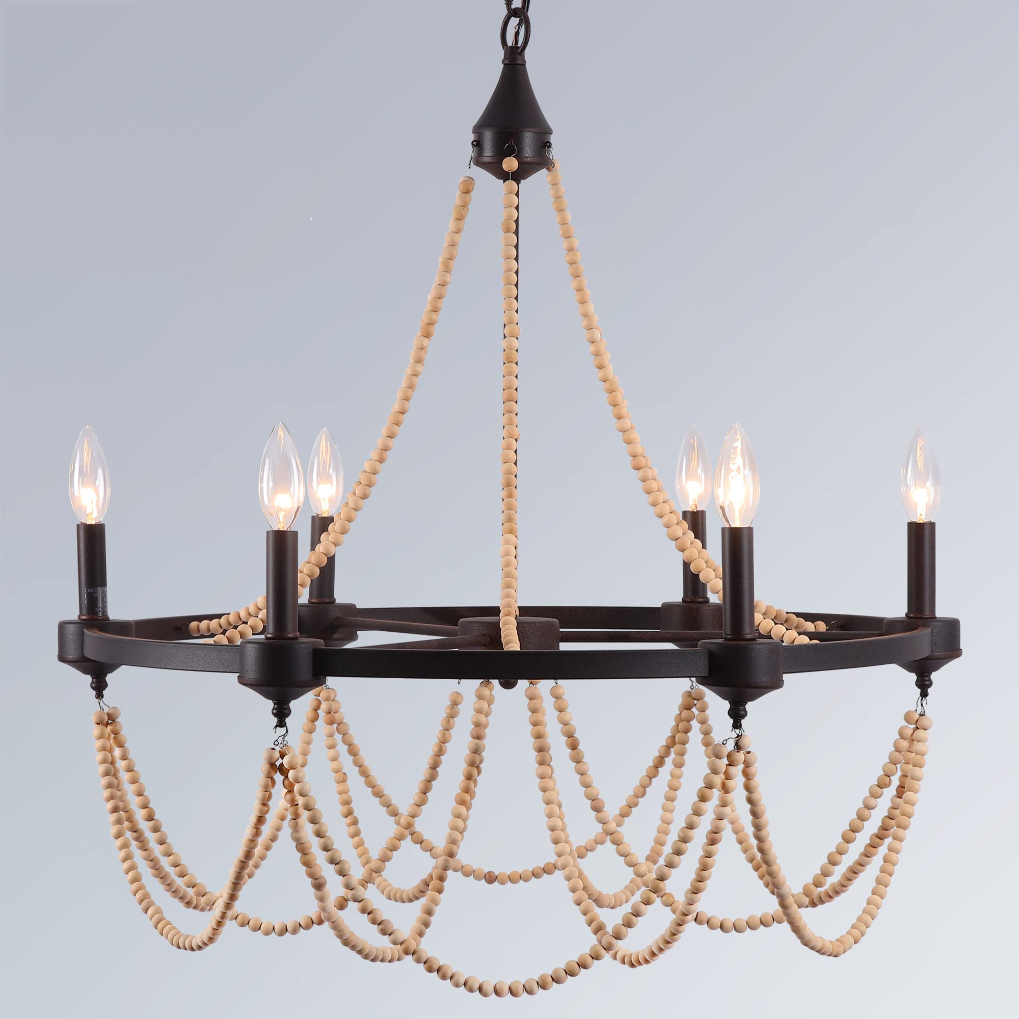Photo 1 of COCOSTAR 28" Natural Wooden Bead Tassel Rust Iron Black Wagon Wheel Farmhouse Chandelier, 6-Light Retro French Country Candle Chandeliers for Living Room, Coastal Boho Hanging Rusty