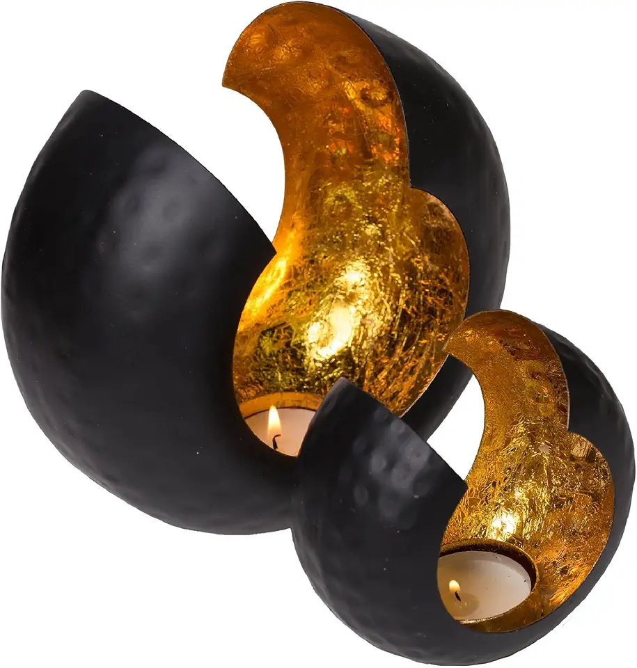 Svarta värmeljushållare med gulddetaljer
