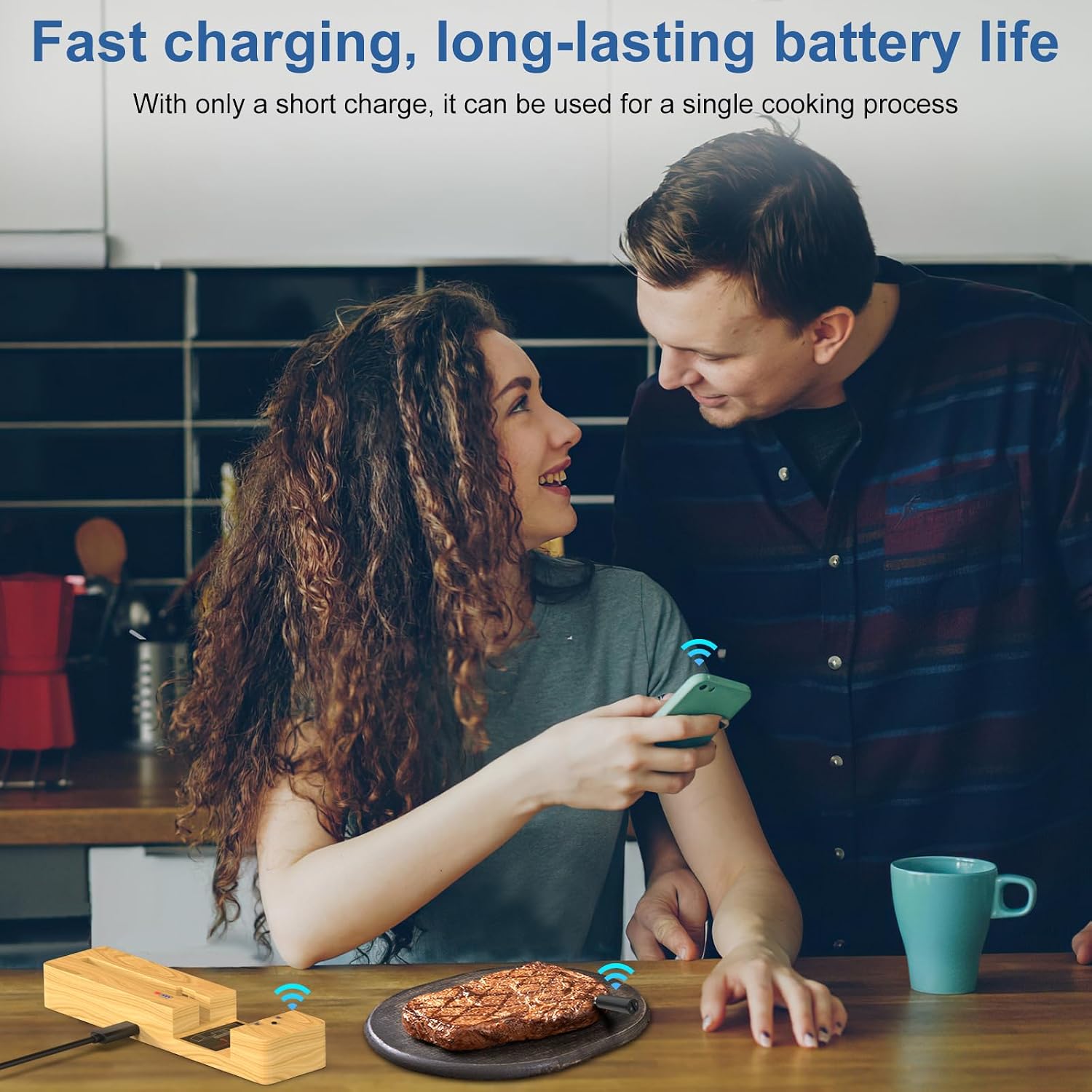 A couple monitoring cooking on their smartphone with the MOGUNDAM Wireless Meat Thermometer repeater and a cooked steak on the table, illustrating fast charging and long battery life.