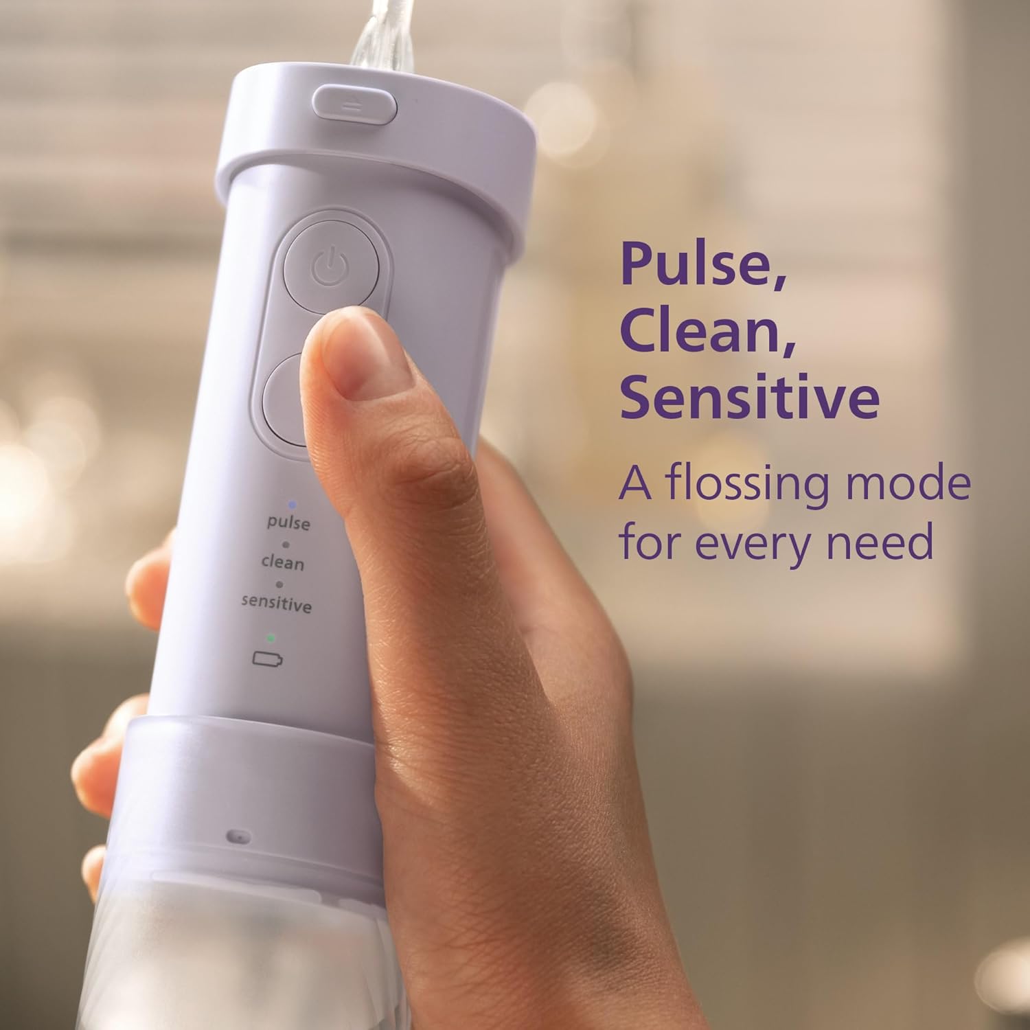 Philips Sonicare Compact Flosser 1000, Portable Water Flosser with 3 Flossing Modes, IPX7 Waterproof Oral Irrigator, Travel Friendly, Purple, Model HX3333/23