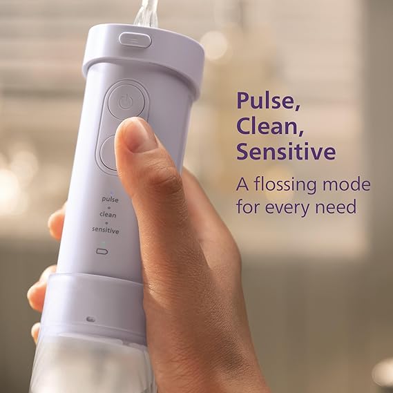 Philips Sonicare Compact Flosser 1000, Portable Water Flosser with 3 Flossing Modes, IPX7 Waterproof Oral Irrigator, Travel Friendly, Purple, Model HX3333/23