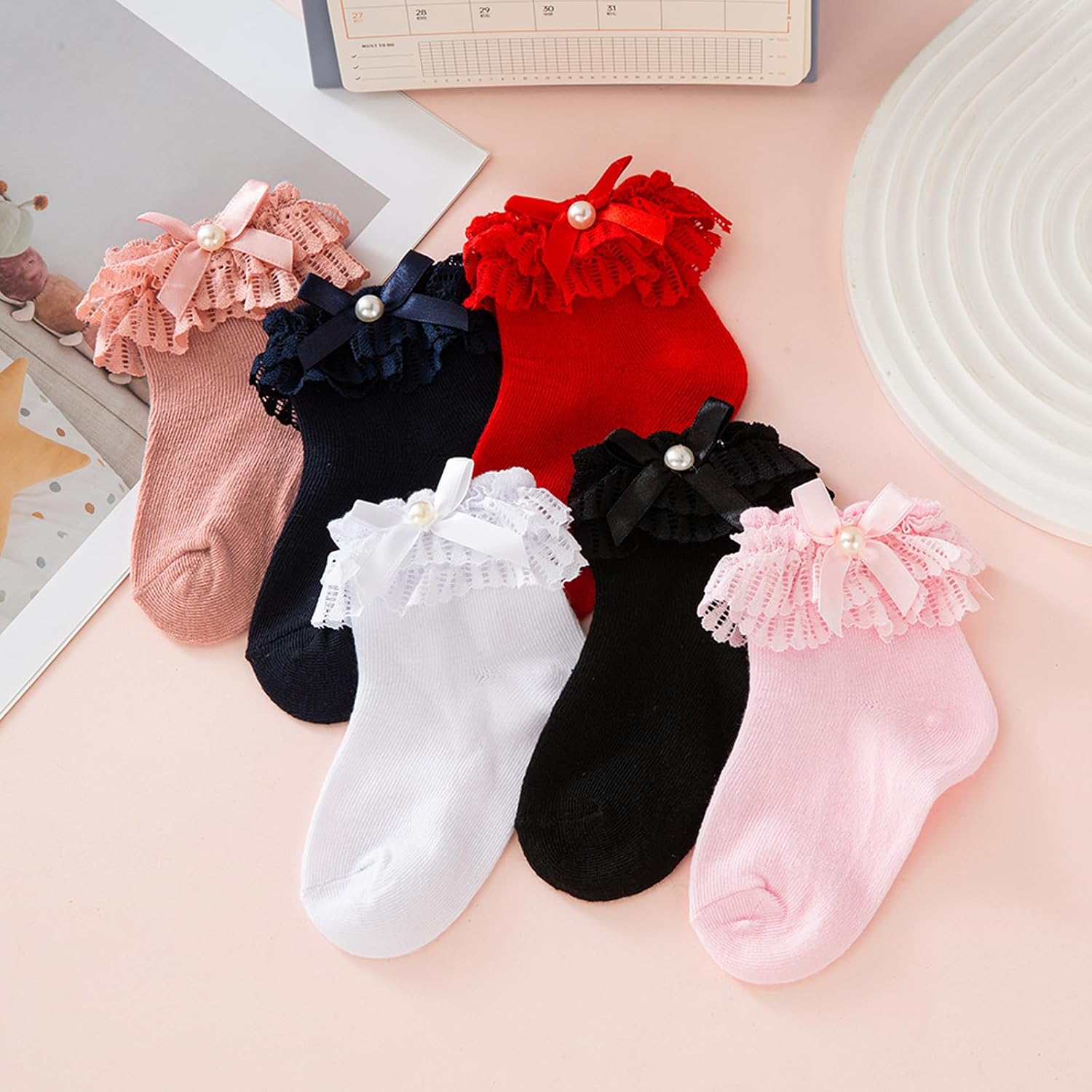 6 pairs of children's and babies' ruffled fringed socks and baby bow princess socks