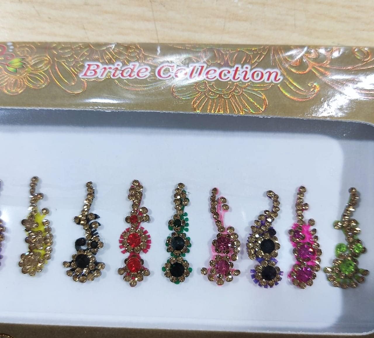 Multicolored Crystal Bindi Bridal face Jewels Forehead Tika Indian Bindis for women bindi Indian multicolor round long small gold (Long Curved - 12 Bindi)