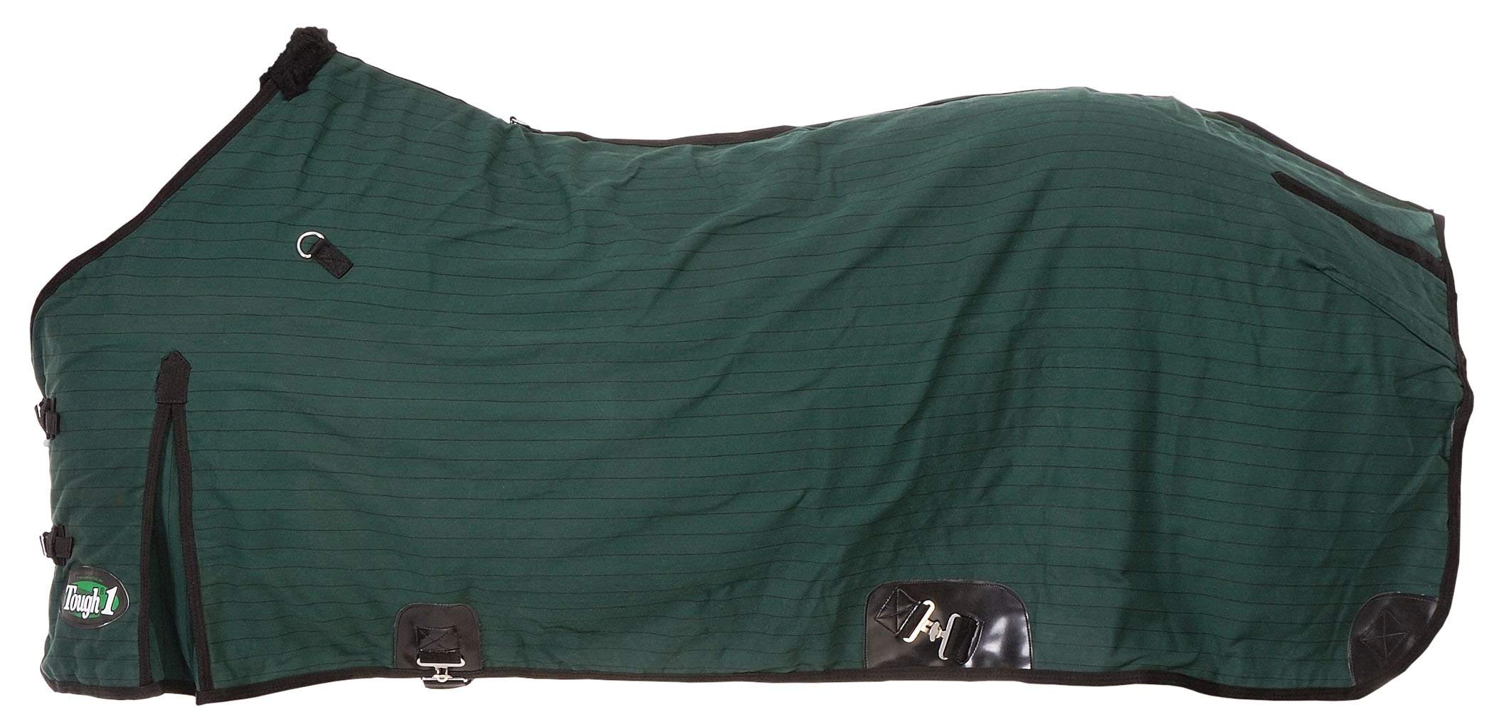 Couverture pour cheval au pré en hiver pour rester au sec sous la pluie et la neige