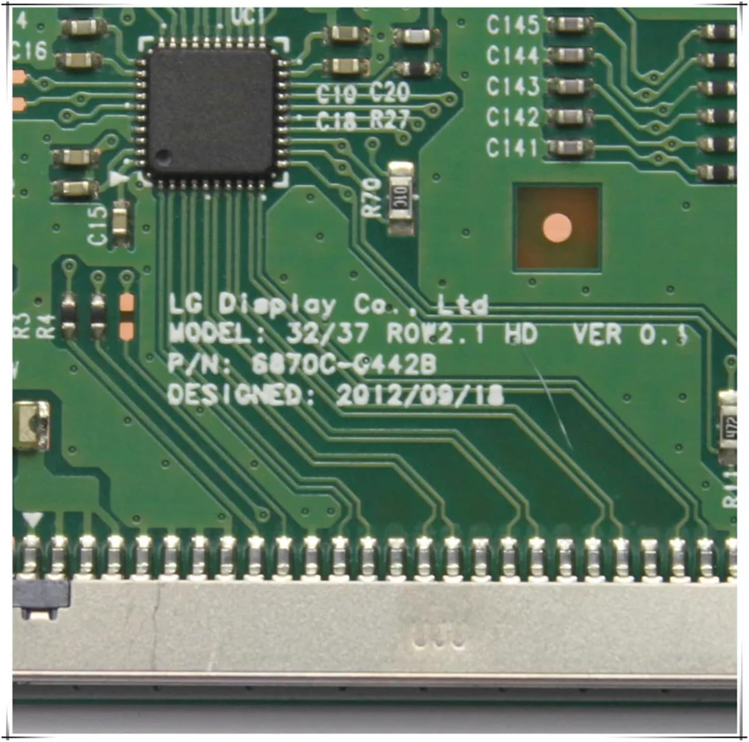 Close-up of the LG Display Co. Ltd. branding and model number on the logic board