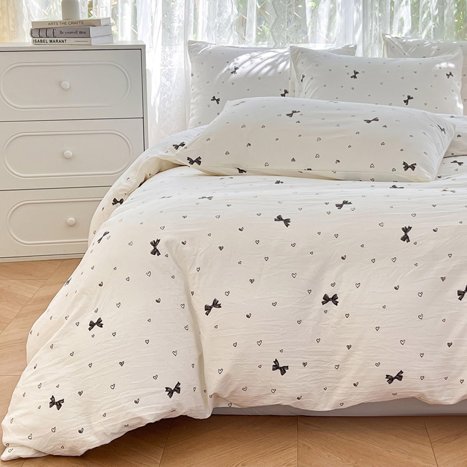 Parure de lit fille avec nœuds et cœurs pour chambre romantique