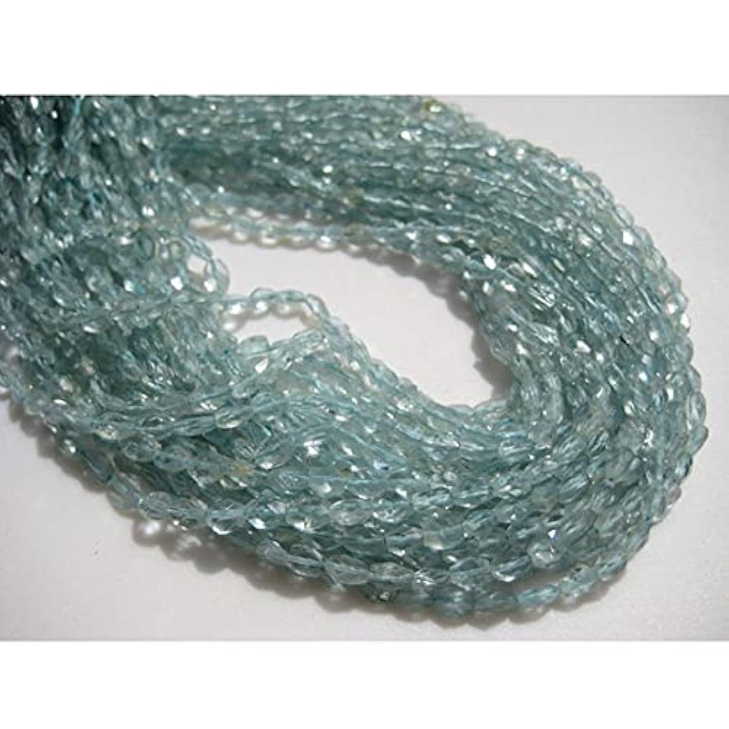 Aquamarine oval nugget beads facettées 4x5mm pour création de bijoux uniques sur fil de 35cm