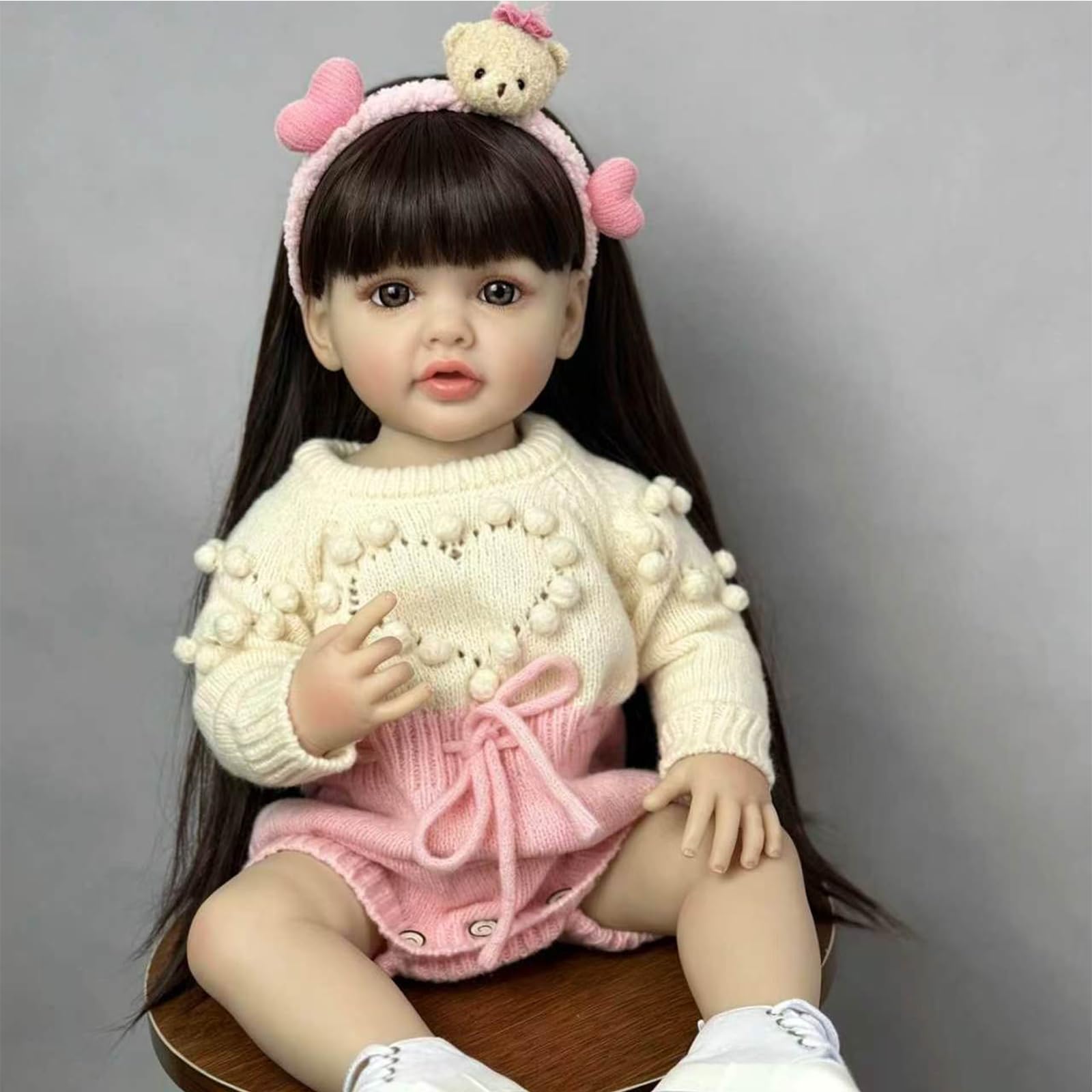 Reborn Lalka 55 cm Realistyczne Dziecko Miękki Silikonowy Winyl, Noworodek Dziewczyna Z Ruchomymi Stawami, Długie Brązowe Włosy, Różowy Strój Z Akcesoriami