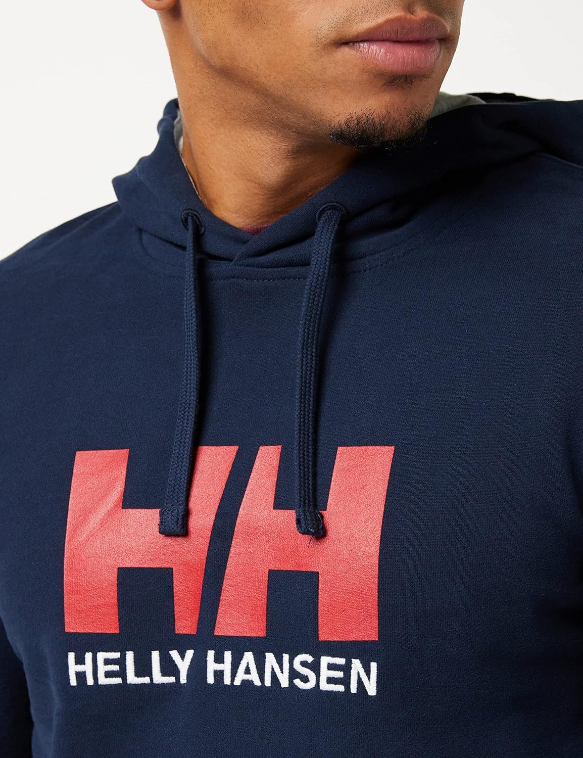 Helly Hansen Logo Hoodie Sudadera para Hombre con Capucha, Sudadera Casual de algodón para Uso Diario y Actividades al Aire Libre + Unisex Logo Cap, Azul Marino, STD