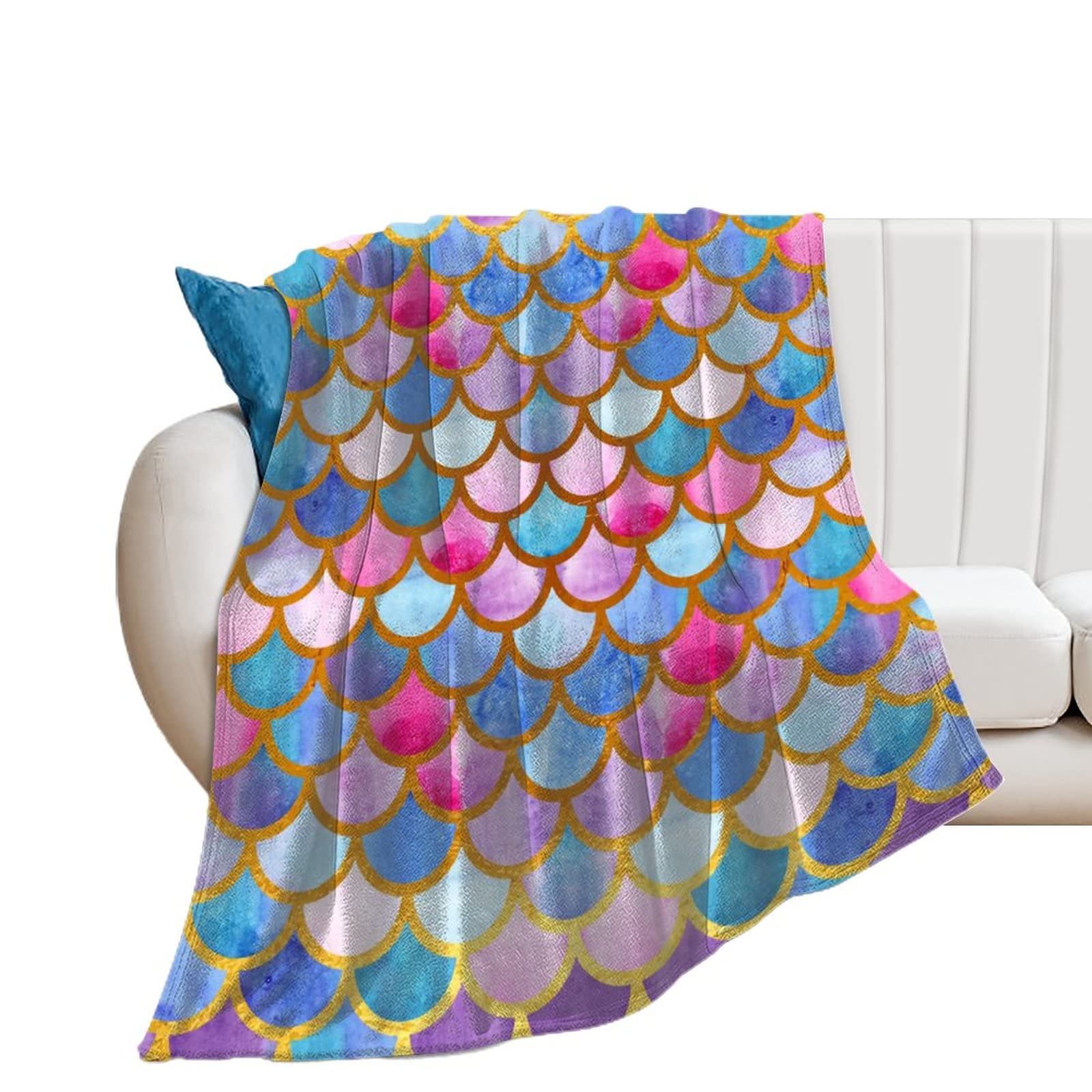 Couverture polaire échelles de couleurs pour vos soirées cocooning sur le canapé