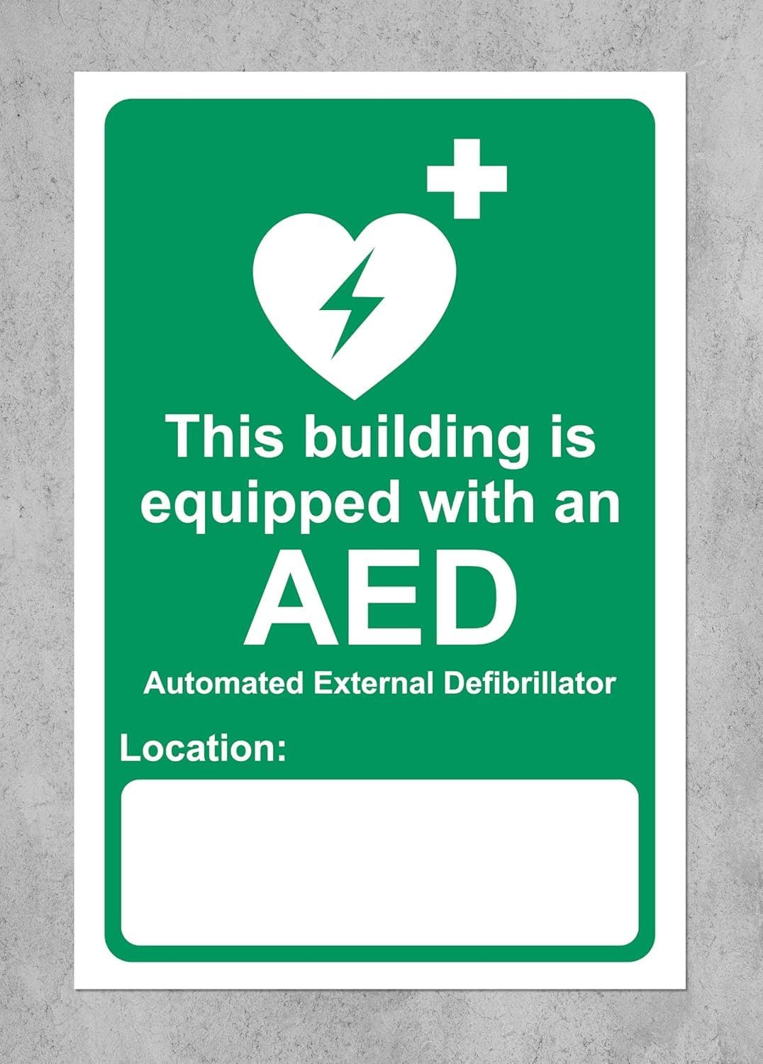 This building is equipped with an AED automated external defibrillator and located at Safety sign - Self adhesive sticker 200mm x 150mm