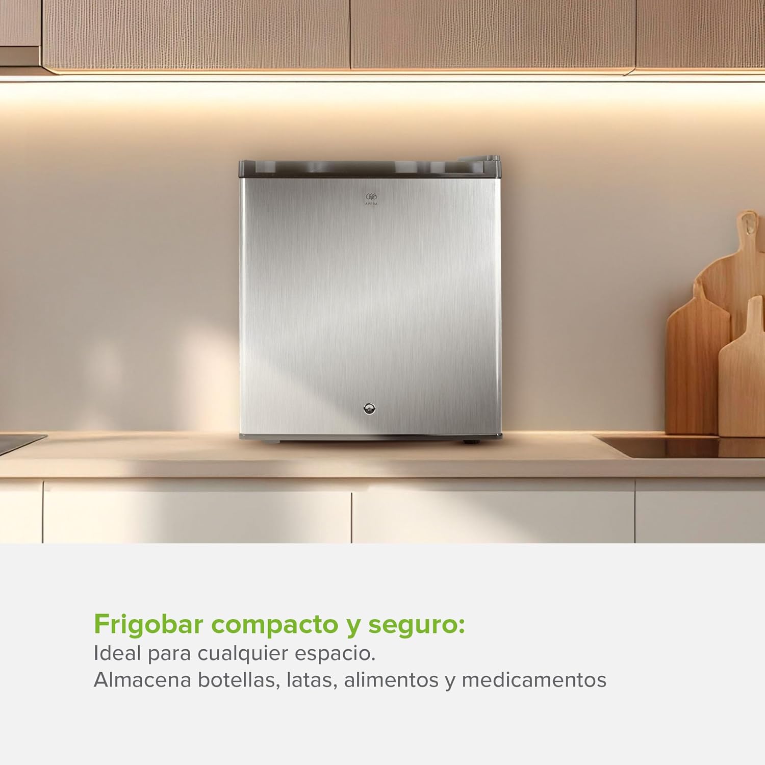 AVERA FB46L frigobar in a kitchen setting, emphasizing its compact size and suitability for storing various items like bottles, cans, food, and medicine.