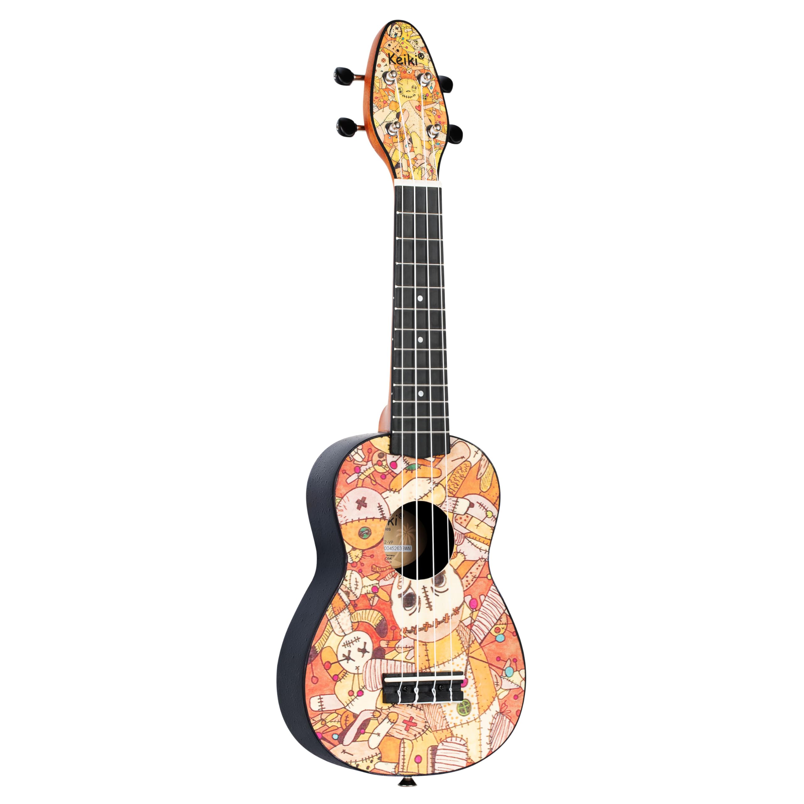 Ortega Guitars Ukelele Soprano - Keiki K2 con diseño de Voodoo Puppet - incluye afinador, 5 puas de grosor medio y funda estilo bolsa con cuerdas con logo Keiki - madera de Kauri, K2-VP